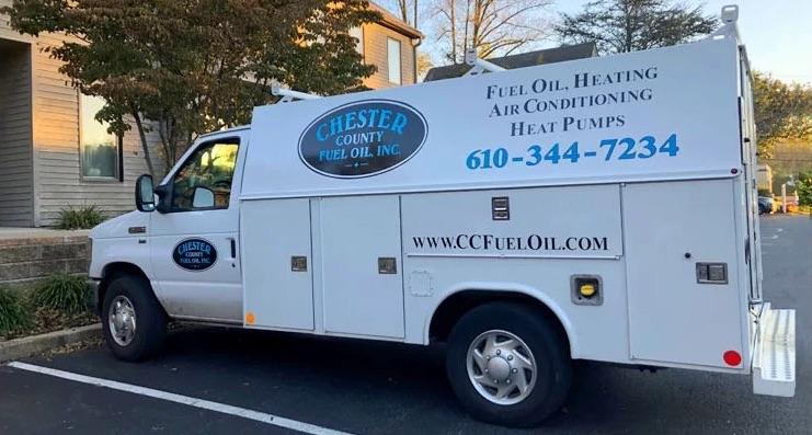 Chester County Fuel Oil truck parked outside of a customer's house