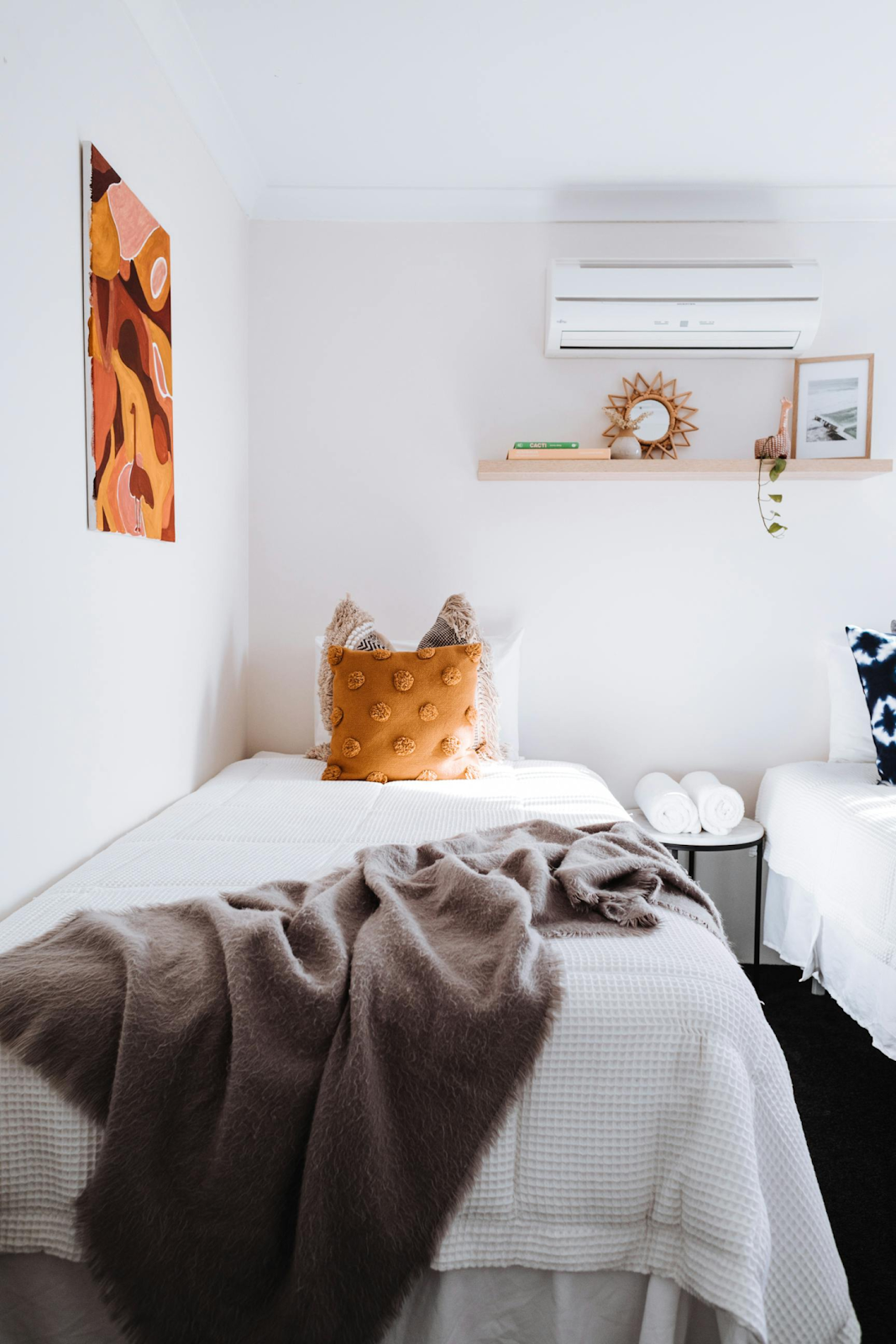 Bedroom with a wall mounted mini split heat pump 