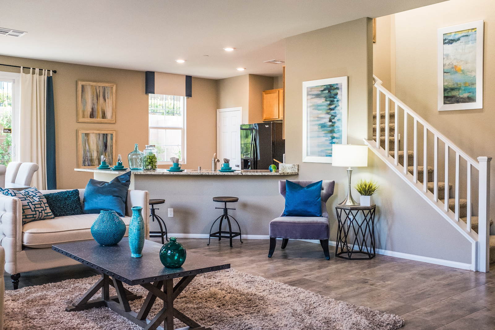 The living room of a home kept comfortable by it's heating/air conditioning systems